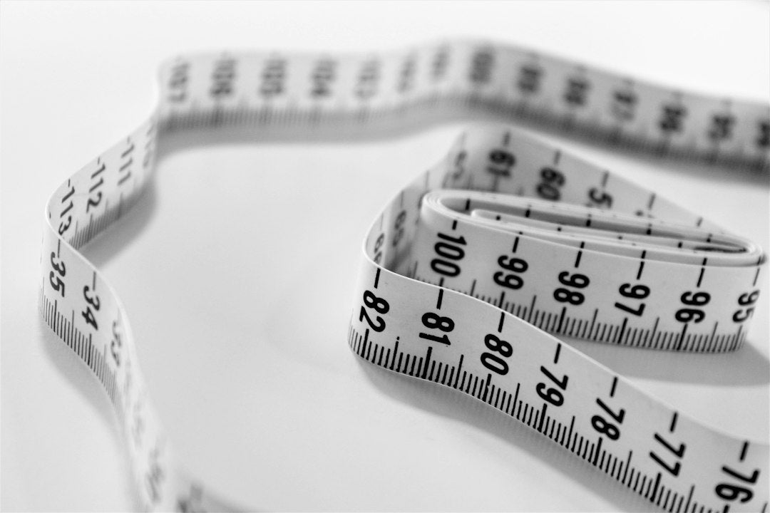 How to Measure Up for Custom Workwear: A Sizing Guide