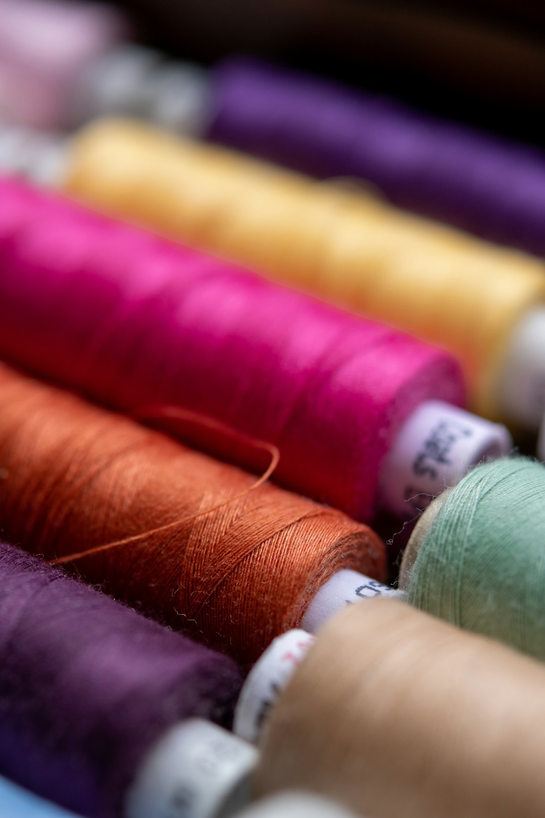 What Thread Colours Work Best for Embroidery on Dark Garments?