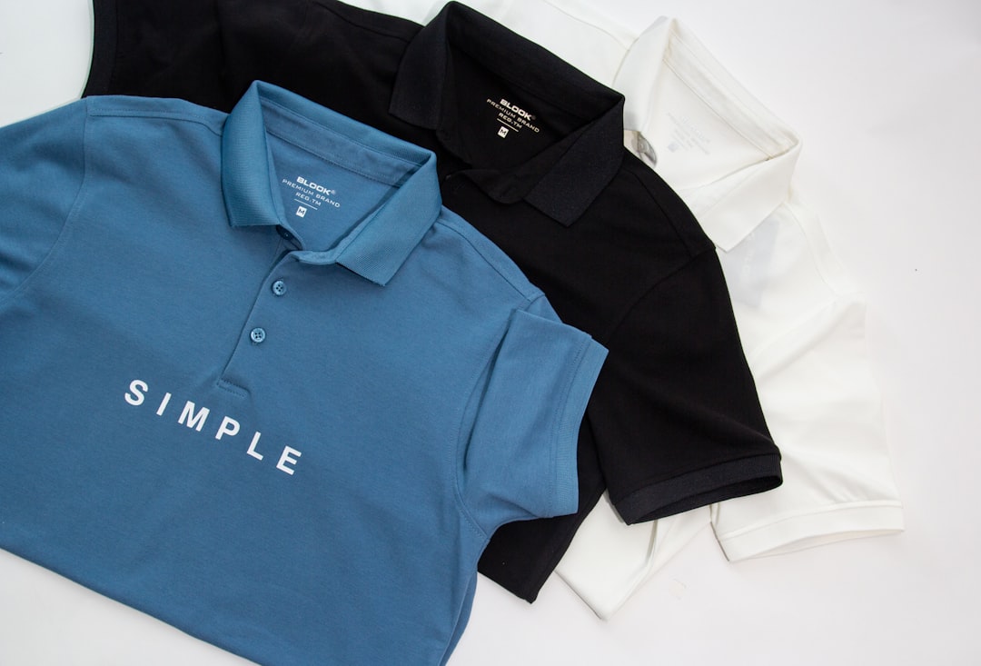 Custom t-shirt design process showing logo placement on a blank t-shirt mockup, demonstrating step-by-step branding and printing workflow for professional custom apparel creation.