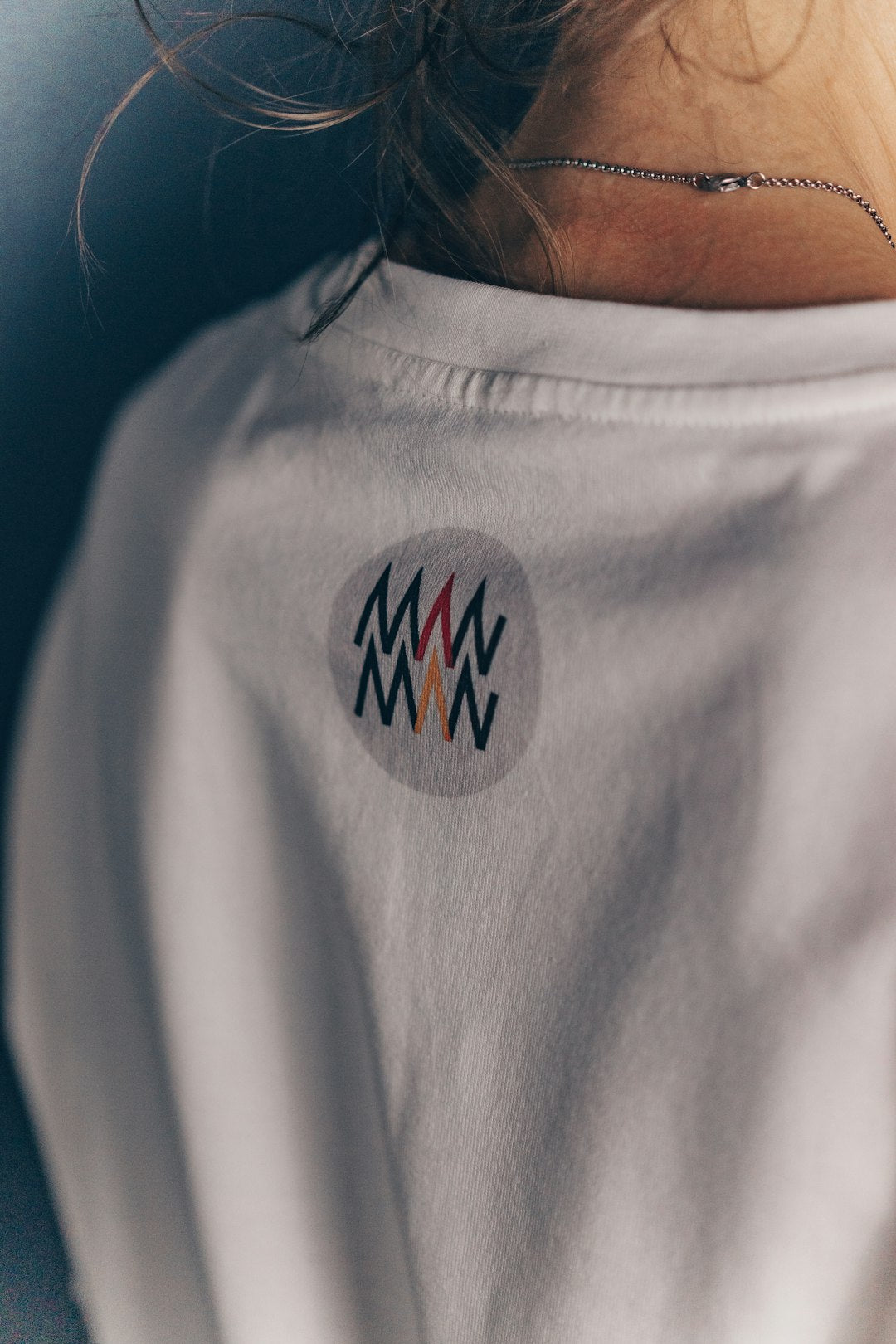 Should You Print a Logo on the Front or Back of a T-Shirt?