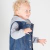 Denim jacket with fleece hood and sleeves